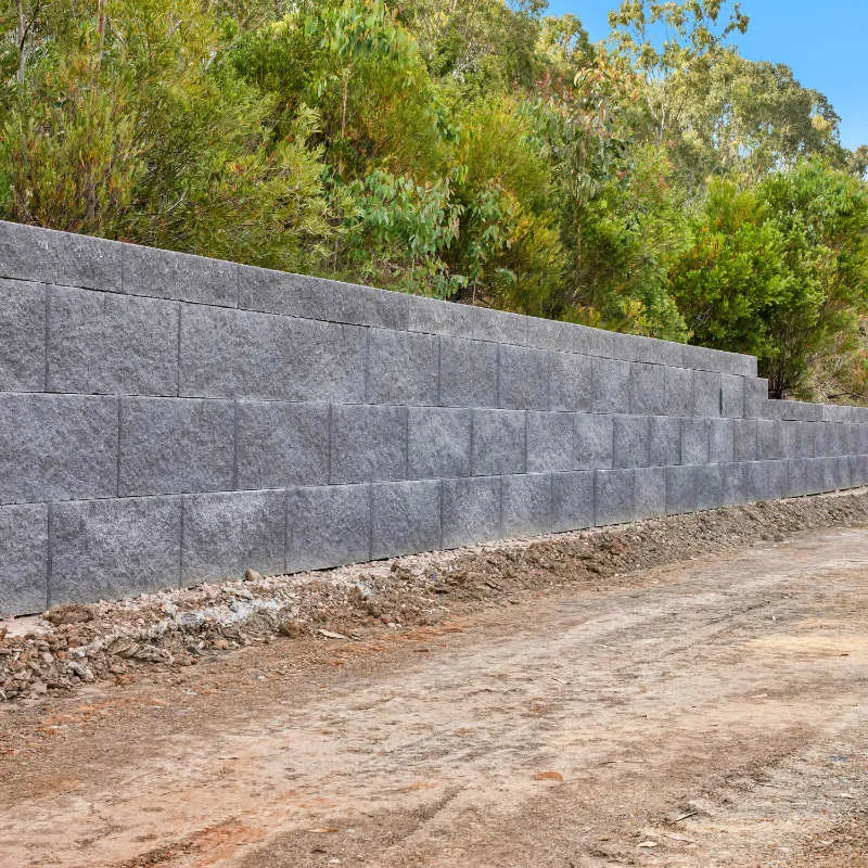 Keymass precast block placed by a UCBC excavator with a block grab