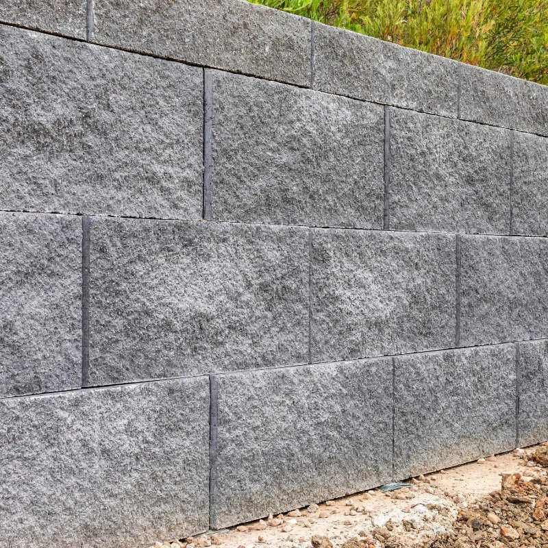 Keymass precast block placed by a UCBC excavator with a block grab