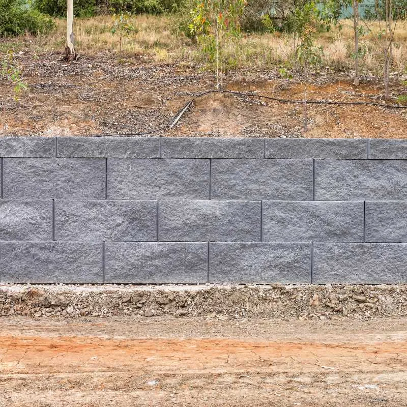 Keymass precast block placed by a UCBC excavator with a block grab