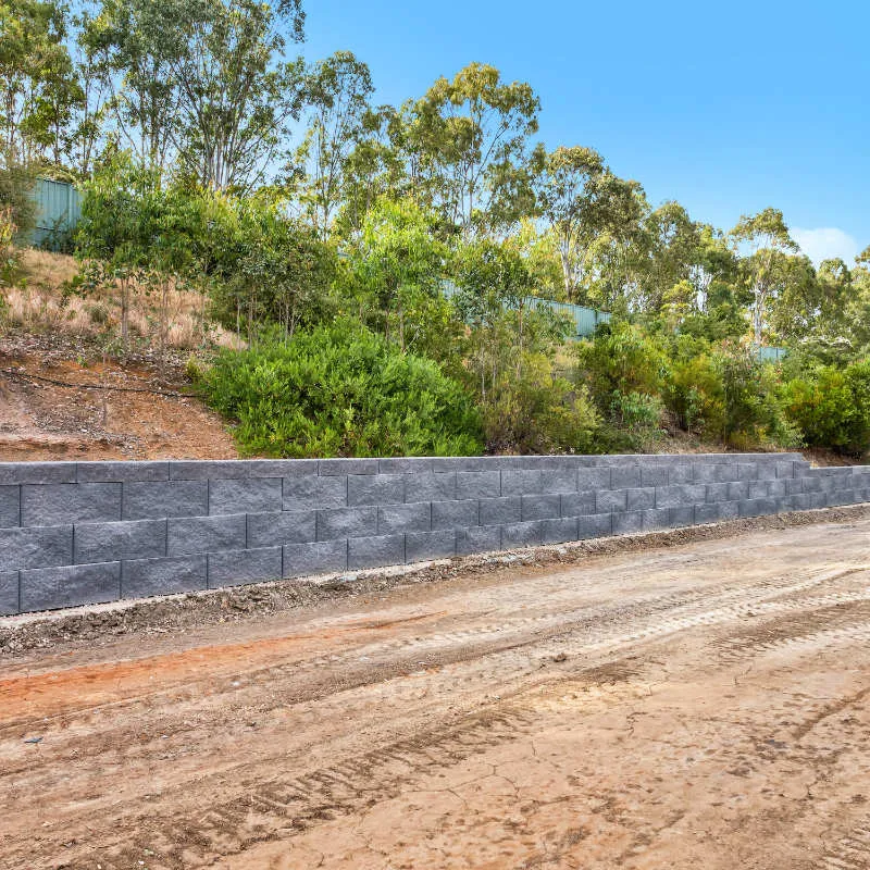 Keymass precast block placed by a UCBC excavator with a block grab