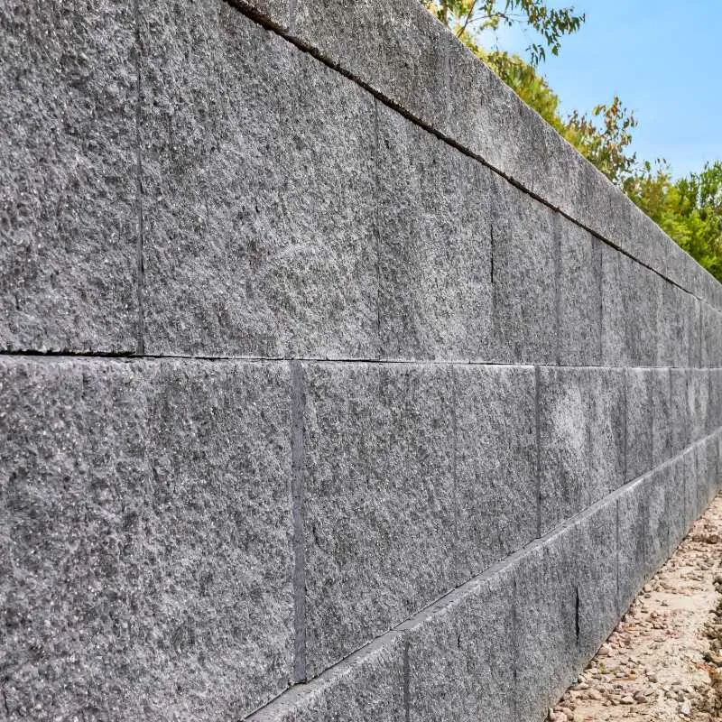 Keymass precast block placed by a UCBC excavator with a block grab